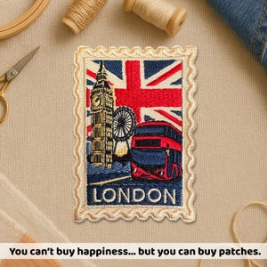 May include: Embroidered patch depicting London landmarks: Big Ben, the London Eye, and a red double-decker bus, set against a Union Jack. The patch has a cream-colored, scalloped border and the word "LONDON" is at the bottom.