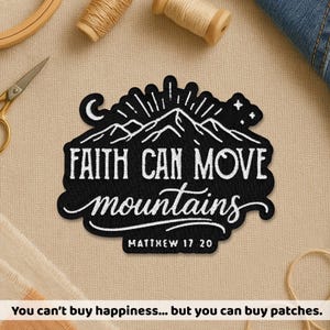 May include: Black embroidered patch with the text "FAITH CAN MOVE mountains" and "MATTHEW 17 20". The patch features a mountain range design with a crescent moon and stars. Sewing supplies are in the background.