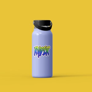 May include: A light blue water bottle with a black lid and handle. The bottle has a rainbow-colored sticker with the word "RYDER" on it.