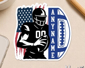 May include: A sticker featuring an American football player in a black uniform, holding a football. The background includes a stylized American flag and a blue football shape with the text "ANY NAME". The sticker has a white border.