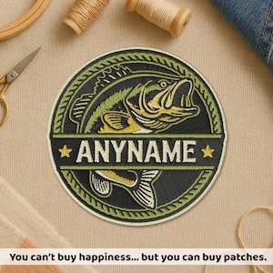May include: Embroidered patch featuring a largemouth bass design in black, green, and yellow. The patch is circular with the text "ANYNAME" and two yellow stars. The patch is surrounded by a green border and is likely for a fishing enthusiast.