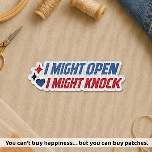 May include: Embroidered patch with the text "I MIGHT OPEN I MIGHT KNOCK" in blue and red. The patch has a white border and decorative elements. The patch is on a beige fabric surface, with sewing supplies in the background.