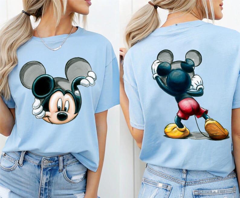 May include: A set of three ceramic mugs with a speckled, cream-colored glaze. Each mug features a different hand-painted floral design in shades of blue, green, and yellow. The mugs have a simple, rounded shape and a comfortable handle.