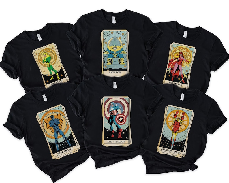 May include: Six black t-shirts with different Marvel character tarot card designs. The designs include The Devil, The Emperor, The Witch, Judgement, The Chariot, and King of Coins.
