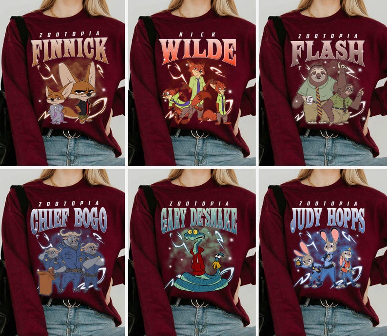 May include: Maroon long-sleeved tops featuring characters from the film "Zootopia." Each top displays a different character's name and image: Finnick, Nick Wilde, Flash, Chief Bogo, Gary De'Snake, and Judy Hopps. The tops are paired with blue jeans.