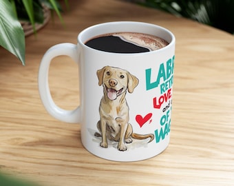 May include: White ceramic coffee mug with a yellow Labrador Retriever illustration and the text "Labrador Retriever Love, and a whole lot of wags".