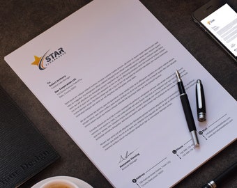 May include: A white letterhead with a blue and yellow star logo that says "STAR" and "SLOGAN HERE". The letterhead includes a business address, phone number, and email address. The text on the letterhead is in a black font.