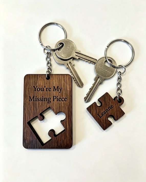 Single puzzle-piece wooden keyring engraved with a name — the "missing piece" framing makes it one of the most emotionally resonant under-$10 gifts on the platform.