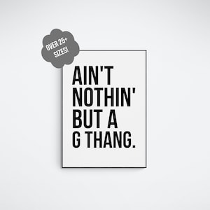 May include: A framed black and white print with the text "AIN'T NOTHIN' BUT A G THANG." A gray cloud-shaped graphic in the upper left corner reads "OVER 25+ SIZES!"