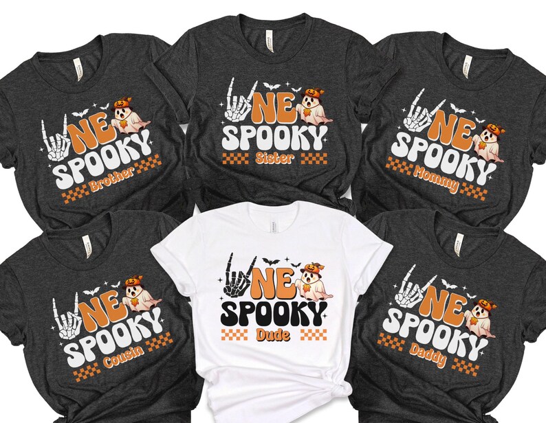 six t-shirts with a Halloween theme, featuring the text "NE SPOOKY" and various Halloween-related graphics and characters.