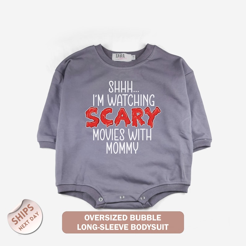 a baby bodysuit that says i'm watching scary movies with mommy