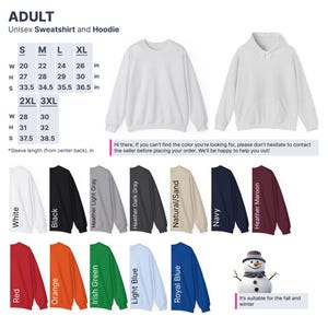 a white sweatshirt with a snowman on the front and a snowman on the