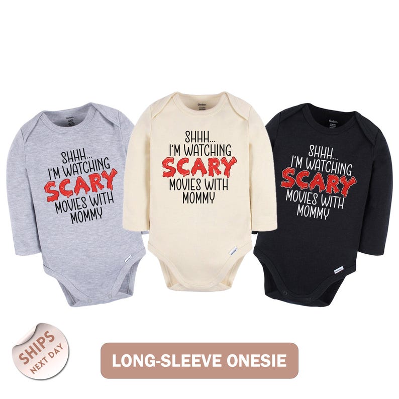 three long sleeve onesuits that say i'm watching scary movies with mom