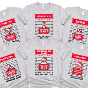 A collection of six gray t-shirts with Christmas-themed designs and text, including various holiday-related puns and phrases.
