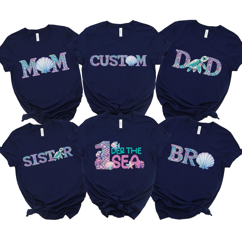 a group of shirts with the words mom and dad on them