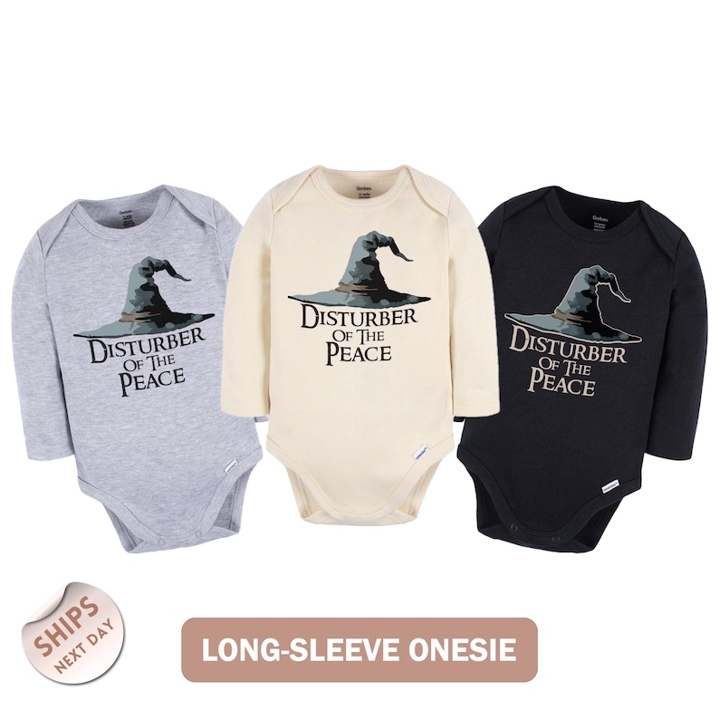 Three long-sleeve onesies with a graphic of a wizard's hat and the text "Disturb of the Peace" printed on them.
