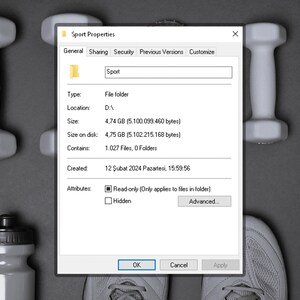 May include: A computer screen displaying a folder properties window. The folder is named "Sport" and contains 1,027 files and 0 folders. The folder is located on drive D and was created on February 12, 2024 at 3:59:56 PM. The folder is 4.74 GB in size and takes up 4.75 GB of disk space.