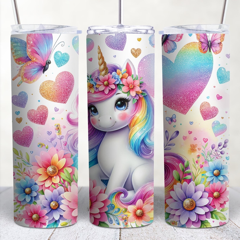 May include: A white unicorn with a rainbow mane and tail, wearing a flower crown, surrounded by colorful flowers and hearts. The background is white with glitter accents.