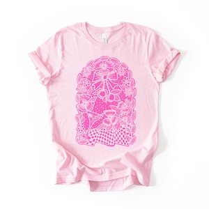 Pink coquette picnic scene tshirt for women, lightweight crewneck with original graphics with pink bow, cherries, dirty martini and flowers.