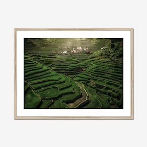 Aerial view of the magnificent Batad rice terraces in the Philippines, a captivating example of human ingenuity and the harmonic, sustainable relationship between people and their environment.