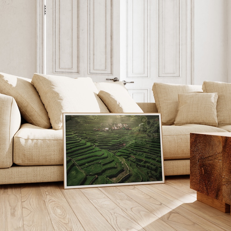 Aerial view of the magnificent Batad rice terraces in the Philippines, a captivating example of human ingenuity and the harmonic, sustainable relationship between people and their environment.