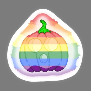 May include: A rainbow-coloured pumpkin with a green stem. The pumpkin is outlined in white and has a watercolour effect.