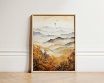 May include: A watercolor painting of a misty mountain landscape with a forest in the foreground. The mountains are painted in shades of blue and gray, with a soft, hazy effect. The forest is painted in shades of green and brown, with a few trees standing out in the foreground. The painting is framed in a light wood frame.