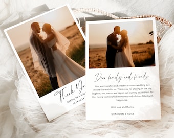 May include: A wedding thank you card featuring a photograph of the bride and groom kissing. The card has a white background with black text that reads "Thank You" with the bride and groom's names and wedding date. The text also reads "Dear family and friends. Your warm wishes and presence on our wedding day meant the world to us. Thank you for sharing in the joy, laughter, and love as we began our journey as partners for life. Here's to cherished memories and a future filled with happiness. With love and thanks, Shannon & Ross."