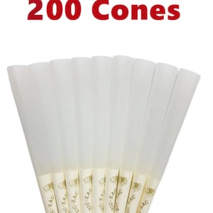 May include: A set of three ceramic mugs with a speckled, matte finish. The mugs are in shades of cream, light gray, and dark gray. Each mug has a simple, minimalist design, perfect for coffee or tea.