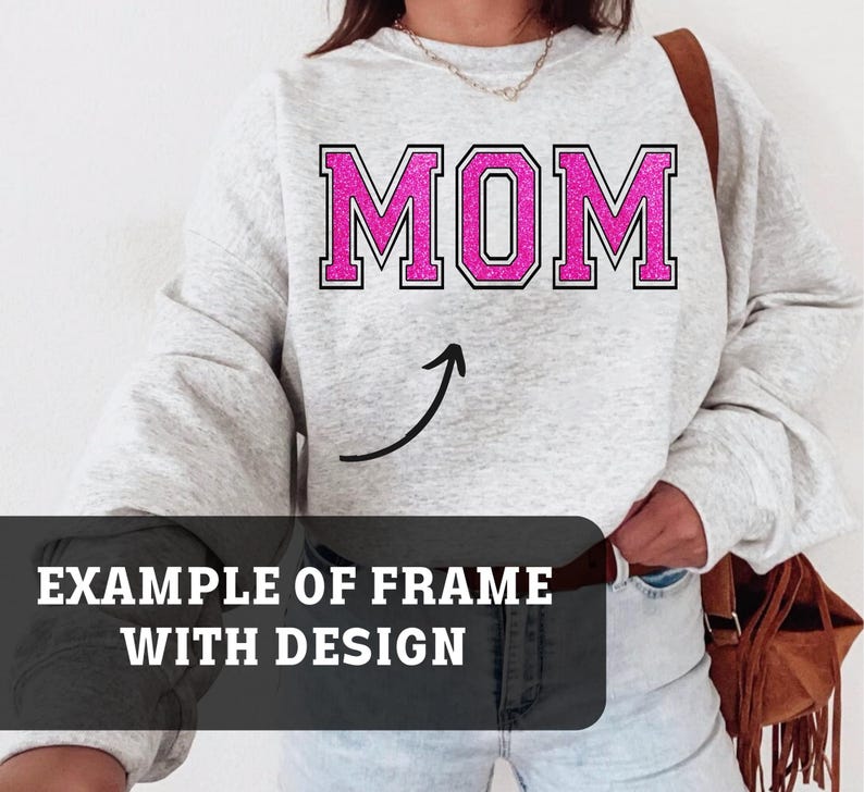 May include: A gray sweatshirt with the word "MOM" in pink glitter letters. An arrow points up from the word.