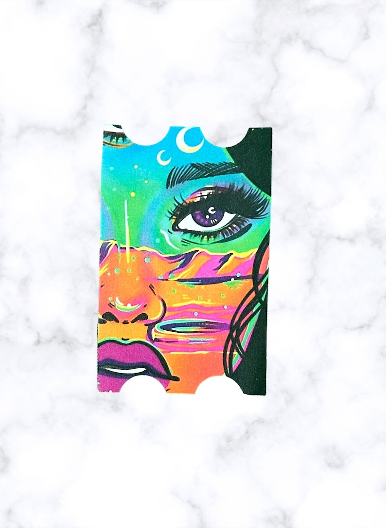 May include: A colorful digital illustration of a woman's face with a single eye, a pink mouth, and a blue, green, and orange background. The background features a crescent moon and stars.