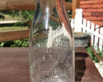 Antieke melkfles een pint glazen fles vintage zuivel keukendecor Kempers boerderij zuivel reliëf melkfles