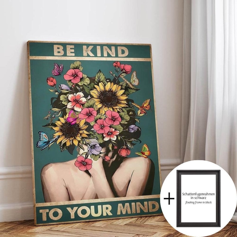 May include: A teal poster with gold text reading "BE KIND TO YOUR MIND". The artwork depicts a person with a floral headpiece of sunflowers and pink flowers, with butterflies. A black floating frame is included.