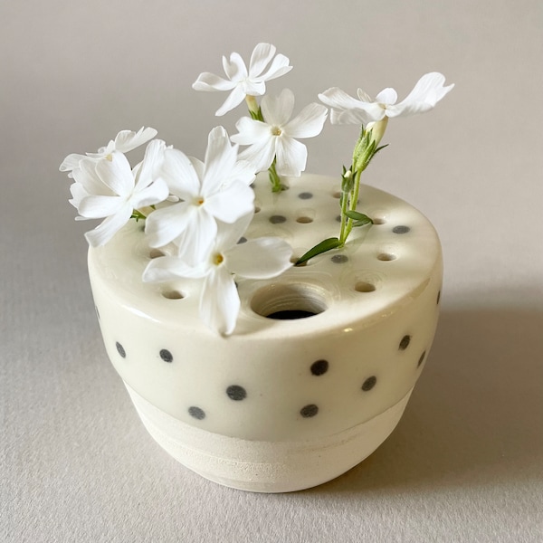 Vase with small flowers, flower pot, delicate