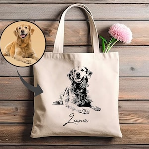 May include: A white canvas tote bag featuring a black and white illustration of a golden retriever dog. The dog is lying down and looking up. The name "Luna" is written in cursive below the dog.
