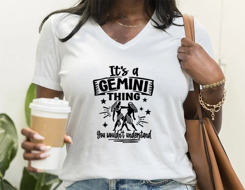 May include: White t-shirt with black text that reads 'It's a Gemini thing You wouldn't understand' with a graphic of two Gemini zodiac symbols.