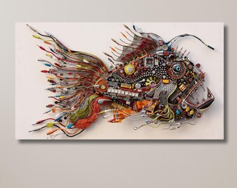 May include: A colorful fish sculpture made from recycled electronics and wires. The fish is depicted in profile, with its mouth open and its fins spread out. The sculpture is set against a white background.