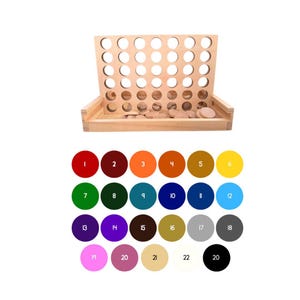 May include: A wooden Connect Four game with a grid of holes and a tray. The game includes a set of colored discs, numbered 1 through 22, for play. The game is set against a white background.
