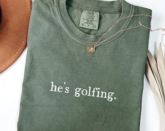 He's Golfing Shirt, Golfing Season Shirt, Golfer Wife Shirt, Golfing Mom Shirt, Golf Player Shirt for Mom, Golf Lover Shirt, Comfort Colors