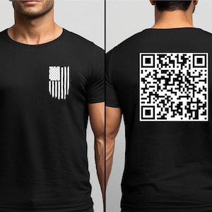May include: Black t-shirt with a white distressed American flag design on the front and a black and white QR code on the back.