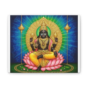 May include: A canvas print featuring a deity with dark skin, adorned in gold jewelry and a crown, seated on a pink lotus flower. The background is a vibrant blue with a golden halo, and two ornate lamps hang on either side. The deity wears yellow and pink garments.