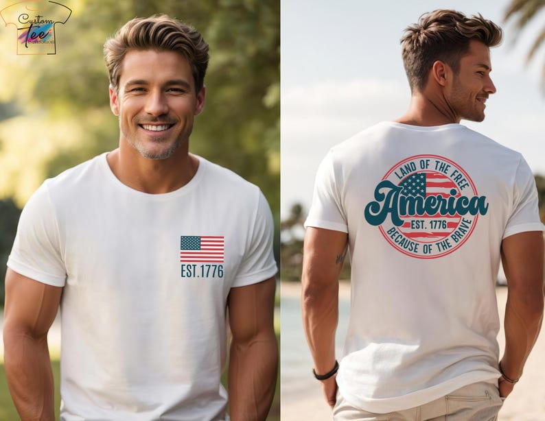 May include: A gray t-shirt with a small American flag on the front and a larger circle design on the back. The circle design features a larger American flag, the text "Land of the Free", "America", "Est. 1776", and "Because of the Brave".