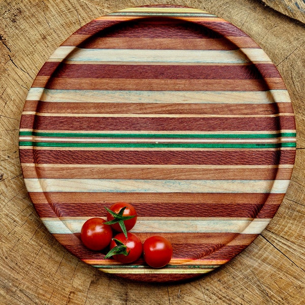 Stripped wood plate made with assorted woods and reclaimed skateboards