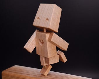 Autómata robot giratorio (el robot salta y gira al girar la manivela).