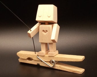 Tiny Robot Automaton flying a kite (it pulls on the kite string when you squeeze the clothespin!)