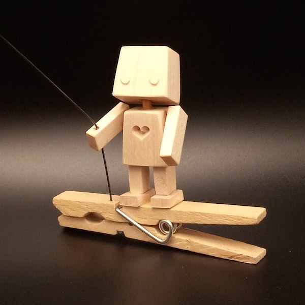 Tiny Robot Automaton flying a kite (it pulls on the kite string when you squeeze the clothespin!)