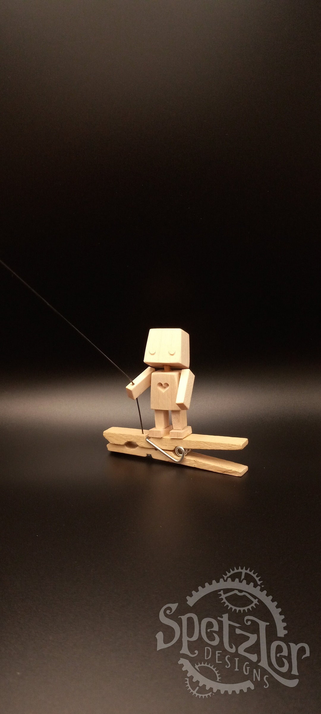 Tiny Robot Automaton Flying a Kite it Pulls on the Kite String When You
