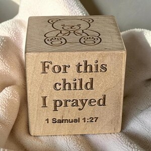 Custom newborn keepsake block with baby name, birth announcement details, and personalized nursery decor design