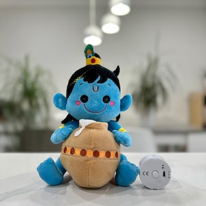 Baby Krishna - 21 cm große Plüschtier mit wiederbespielbarer Spieluhr