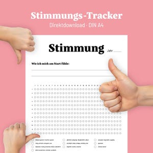 May include: A white mood tracker sheet with the German word "Stimmung" in bold black letters. The sheet includes a section to track daily moods, with a thumbs-up gesture on the right and a thumbs-down gesture on the left.